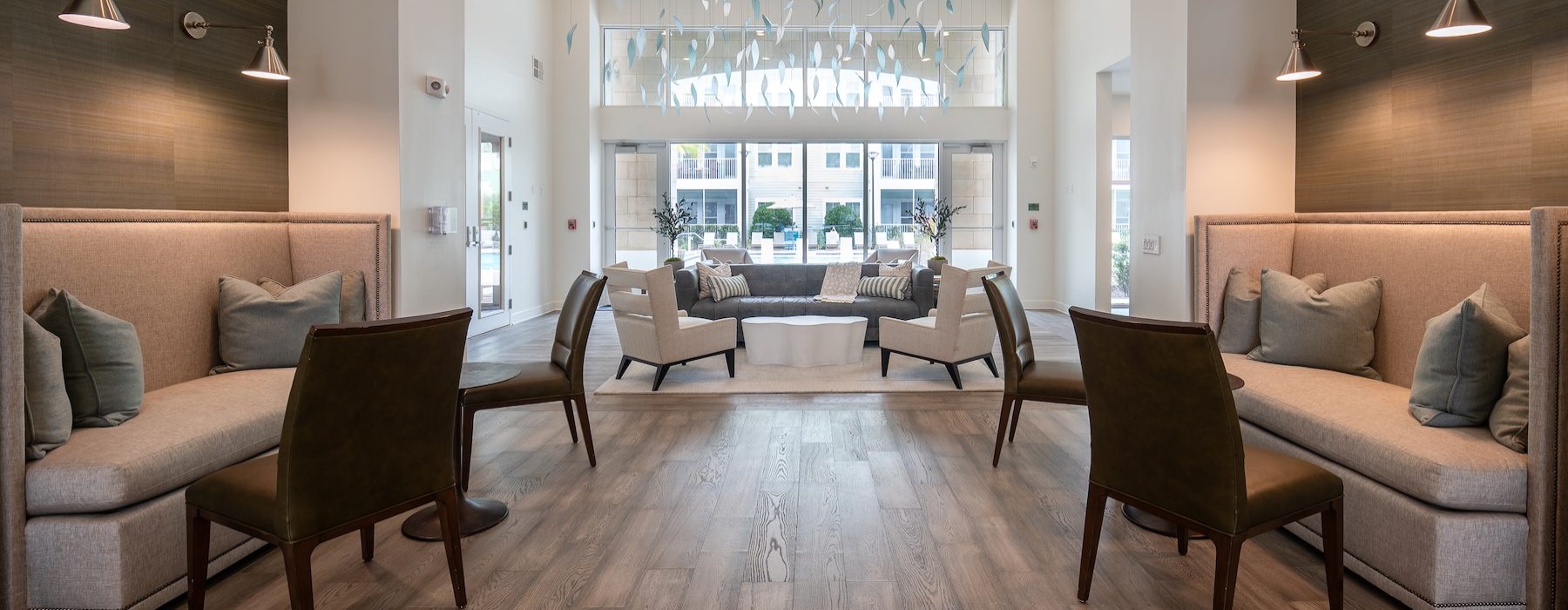a lounge with couches and chairs